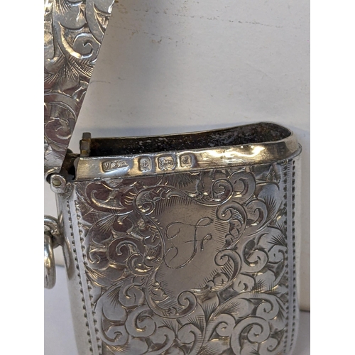 222 - An early 20th century silver engraved vesta case, hallmarked Birmingham 1903, 23.8g
Location: CAB2