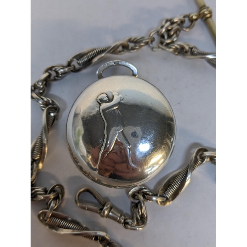 223 - An early 20th century silver fob watch by Talis Watch Co, the front decorated with a golfer, 54.3g, ... 