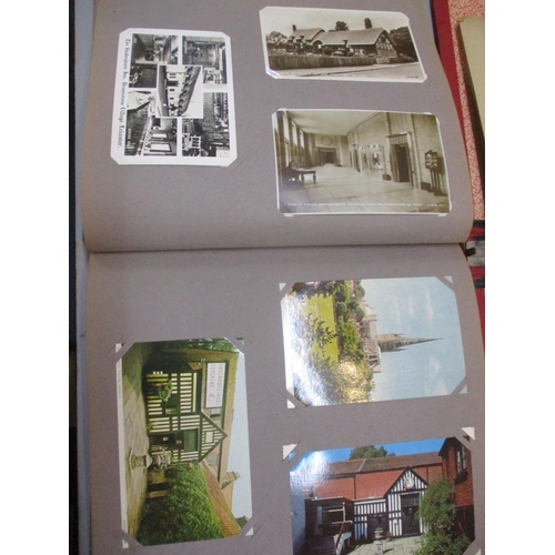 230 - Three postcard albums with approximately 300 post cards of theatres, garden, cats, dogs, goats and o... 