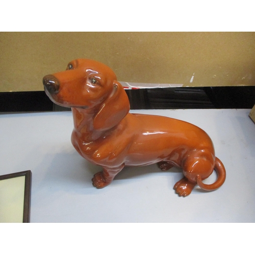 236 - A Beswick model of a Dachshund
Location: 7.4