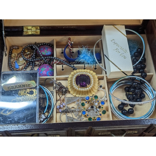 241 - A mixed lot of costume jewellery to include silver and other necklaces, mixed brooches, rings and ot... 