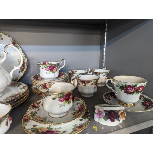 246 - A Royal Albert 'Old Country Roses' part tea set along with a Paragon tea cup and saucer
Location: 6:... 