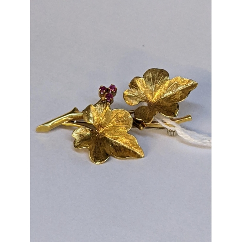 3 - A 18ct gold brooch fashioned as two leaves set with rubies
Location:CAB1