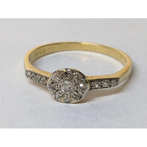 40 - A yellow metal diamond set ring with diamond shoulders, 2.5g
Location: RING