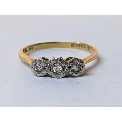 41 - An 18ct gold and platinum diamond three stone ring, 2.1g
Location: RING