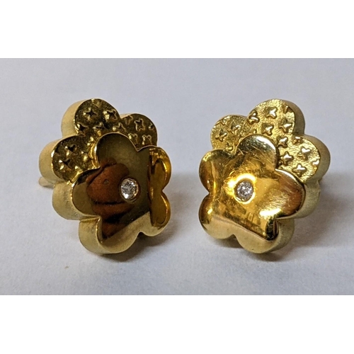 46 - A pair of 18ct gold earrings, each inset with a diamond, 3.5g
Location: CAB3