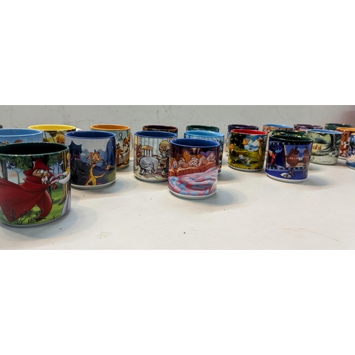 68 - A collection of 21 Disney mugs, to include Nightmare before Christmas, 101 Dalmatians, Bambi and oth... 