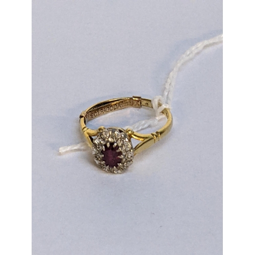 7 - An 18ct gold ring with a ruby and illusion set diamonds, 3.2g
Location: RING