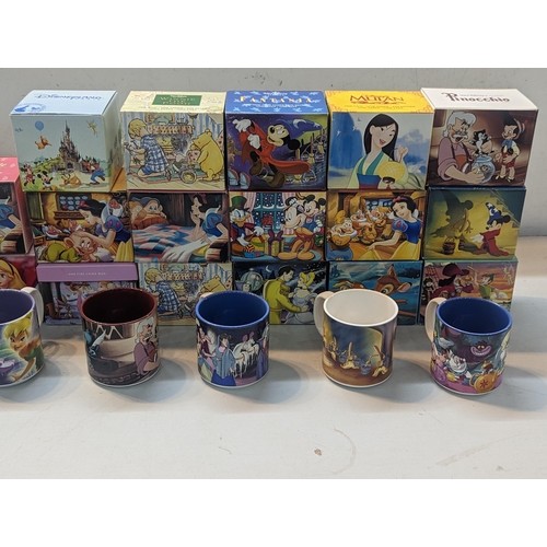 72 - A collection of 23 boxed, 8 unboxed and one large, Disney mugs to include Alice in Wonderland, Mulan... 