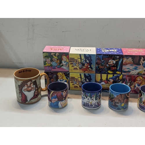 72 - A collection of 23 boxed, 8 unboxed and one large, Disney mugs to include Alice in Wonderland, Mulan... 