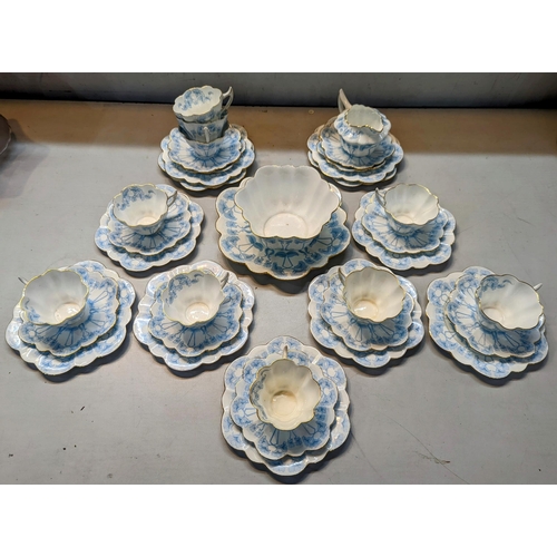 74 - A set of Wileman & Company, 'The Foley China', early 20th century tea cups, saucers and side plates,... 