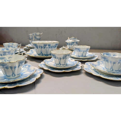 74 - A set of Wileman & Company, 'The Foley China', early 20th century tea cups, saucers and side plates,... 