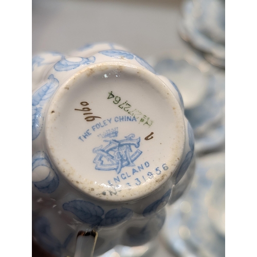 74 - A set of Wileman & Company, 'The Foley China', early 20th century tea cups, saucers and side plates,... 