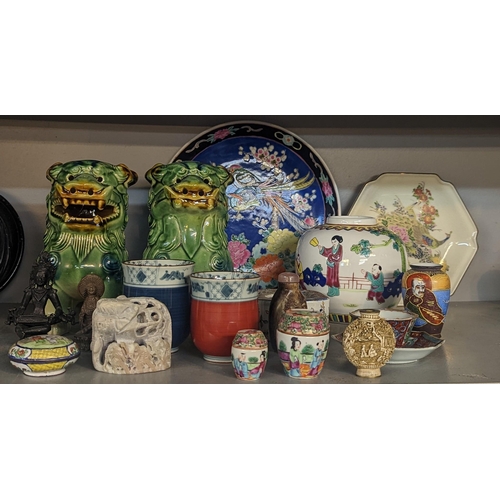 334 - A mixed lot of Oriental ceramics and figures to include tea bowl and saucer, ginger jar, model eleph... 