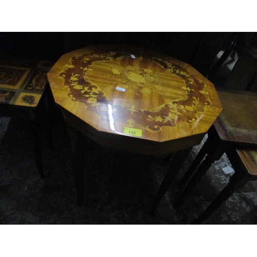 156 - An Italian Sorrento musical table with a dodecahedron inlaid shaped top with hinged lid, on tapering... 