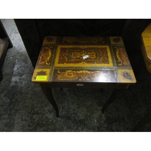 156 - An Italian Sorrento musical table with a dodecahedron inlaid shaped top with hinged lid, on tapering... 