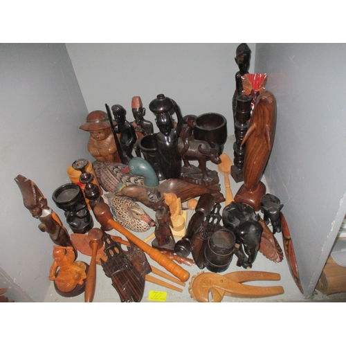 161 - A wide selection of treen to include African carved tribal art wall masks and busts, various boxes a... 