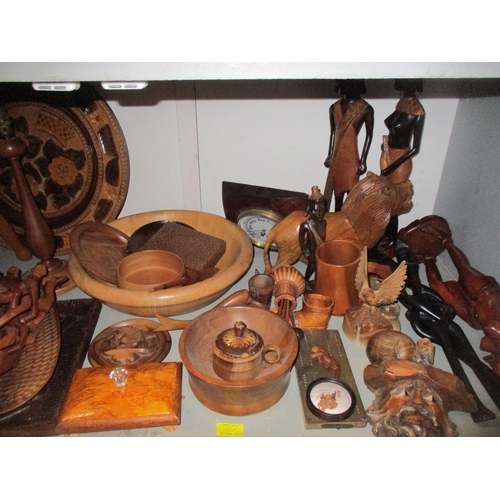 161 - A wide selection of treen to include African carved tribal art wall masks and busts, various boxes a... 