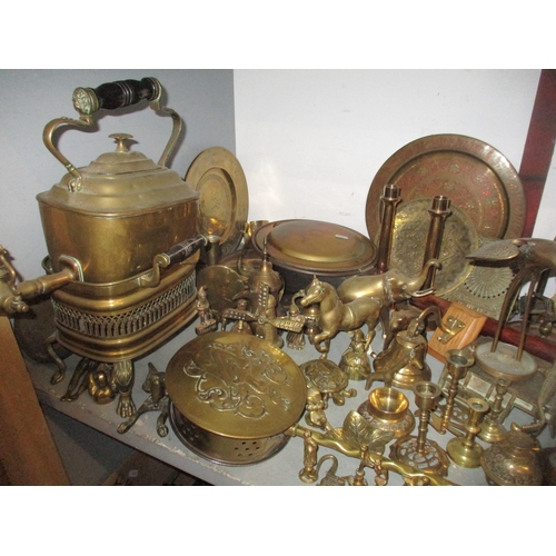 163 - A quantity of brassware to include various lady tea bells, desk bells and others, horse brasses, a p... 