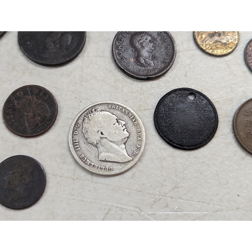 253 - A group of mixed British coinage - a 1675 Charles II farthing, Irish halfpenny, George III halfpenni... 