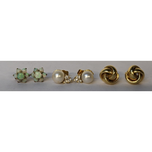 328 - Three pairs of 9ct gold earrings to include a pair of cluster opal earrings, total weight, 11.1g
Loc... 