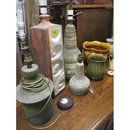 358 - A selection of studio and art pottery table lamps and art pottery to include an Aller vase three han... 