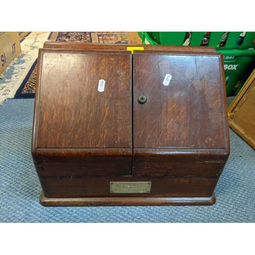 383 - An Edwardian oak stationery box with plaque inscribed 'Presented to R E Mess Gibraltar By Colonel C ... 