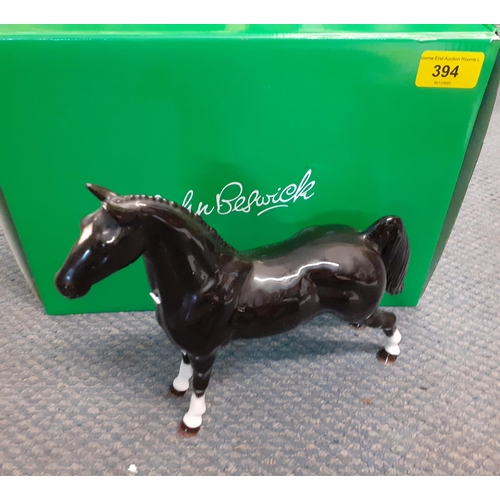 394 - A Beswick limited edition black horse with white socks, with original box
Location: R1.2