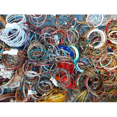 154 - A large quantity of colourful and modern bangles with an Indian theme
Location: RAB