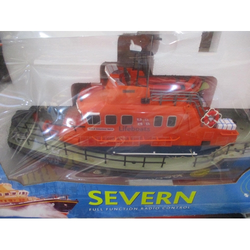 325 - A Lifeboats radio controlled boat, Batman, vehicles and other items Location: LWB