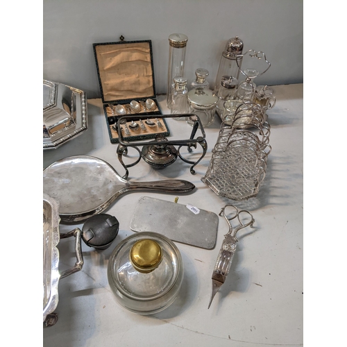 541 - Mixed silver and silver plate to include silver topped dressing table jars and silver mirror, of sil... 