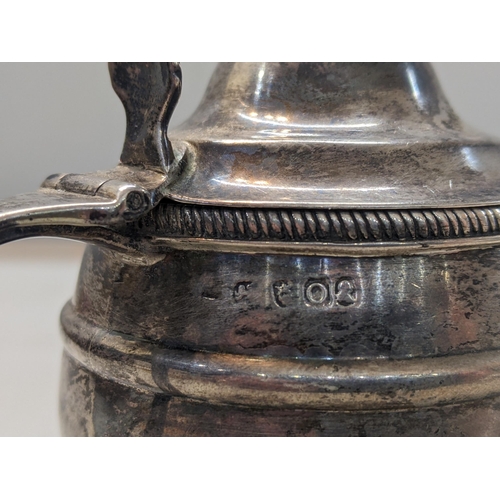 552 - An early 19th century silver lidded mustard of barrel design with a blue glass liner
Location: 10.1