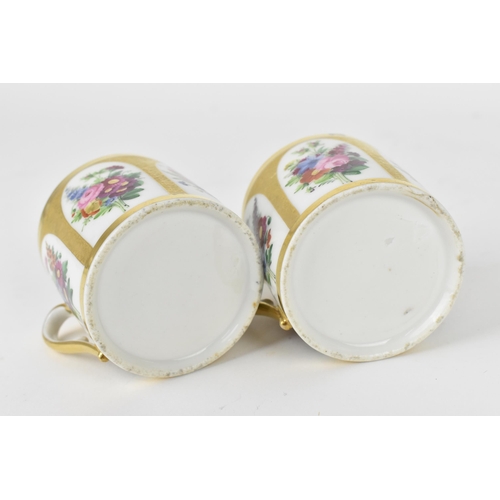 31 - A pair of early 19th century English porcelain demi tasse cups, possibly by Coalport, with hand pain... 