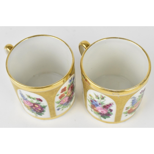 31 - A pair of early 19th century English porcelain demi tasse cups, possibly by Coalport, with hand pain... 