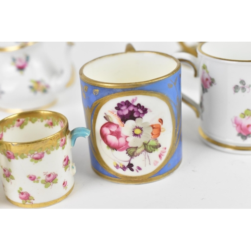 32 - A Crown Staffordshire miniature porcelain cabaret set, with floral pattern, together with two miniat... 