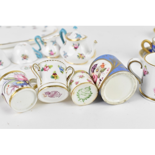 32 - A Crown Staffordshire miniature porcelain cabaret set, with floral pattern, together with two miniat... 