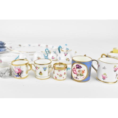 32 - A Crown Staffordshire miniature porcelain cabaret set, with floral pattern, together with two miniat... 