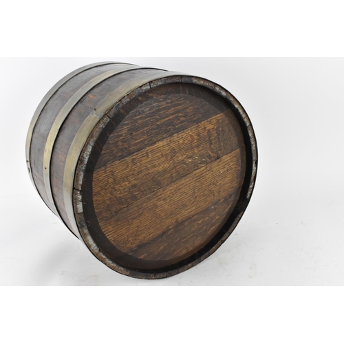 33 - A Georgian brass bound mahogany wine cooler, 30 cm high x 41 cm diameter
Provenance: Contents of the... 