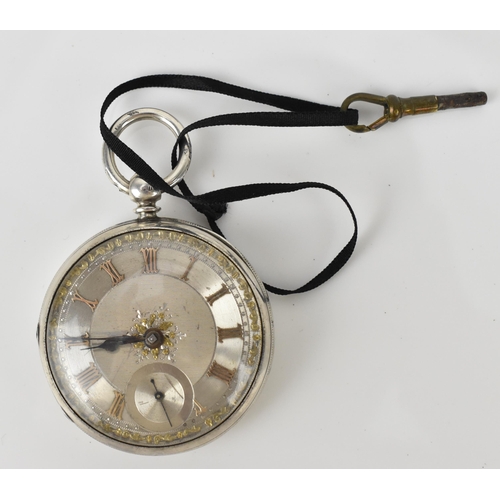 248 - A Victorian silver open faced pocket watch having an ornate silvered engraved dial with gilt highlig... 