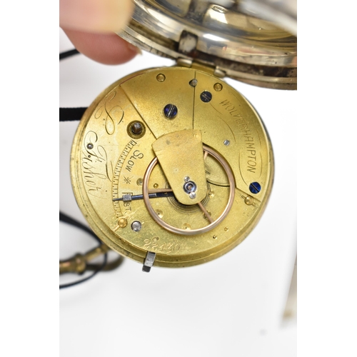 248 - A Victorian silver open faced pocket watch having an ornate silvered engraved dial with gilt highlig... 