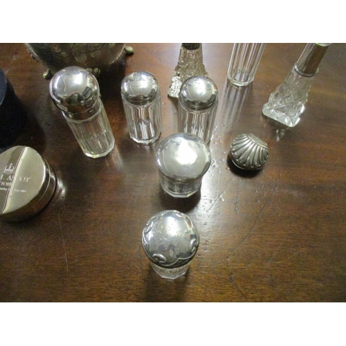 422 - A selection of Edwardian cut glass and silver topped dressing table toilet and scent bottles, to inc... 