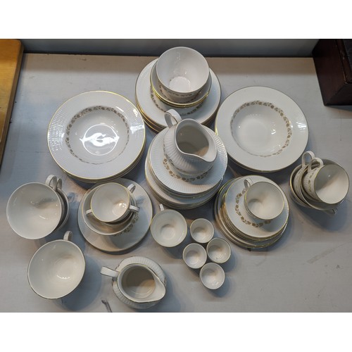 421 - A Royal Doulton Fairfax pattern part tea and part dinner service, comprising of teacups, coffee cans... 