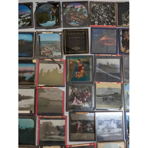 431 - A selection of magic lantern slides to include some depicting scenes of Norwich, Chrysanthemums and ... 