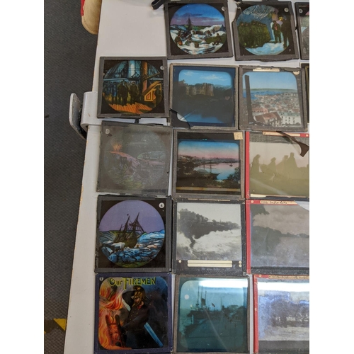 431 - A selection of magic lantern slides to include some depicting scenes of Norwich, Chrysanthemums and ... 