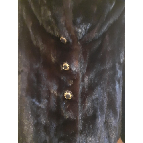 378 - A late 20th Century Blackglama natural dark ranch mink jacket with 3 fabric and gold tone buttons, h... 