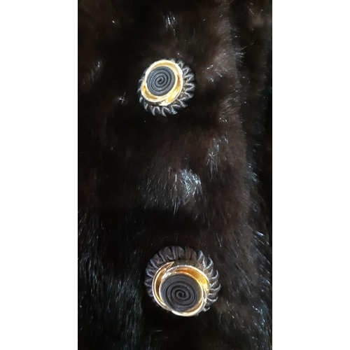 378 - A late 20th Century Blackglama natural dark ranch mink jacket with 3 fabric and gold tone buttons, h... 