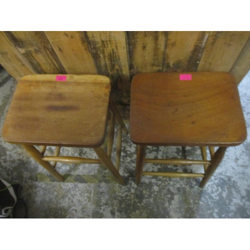 398 - Two vintage chemists lab school stools and a painted wooden plant stand 
Location: G