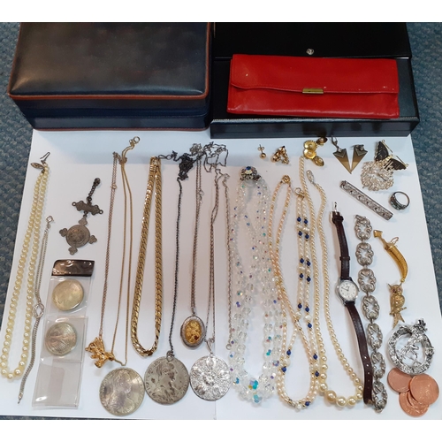 405 - Costume jewellery to include pearl necklaces, gold plated brooches, necklaces, two Theresial coins, ... 