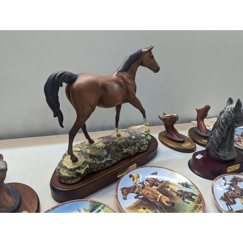 408 - A mixed lot of equestrian related items to include a large Royal Doulton model of a horse entitled T... 