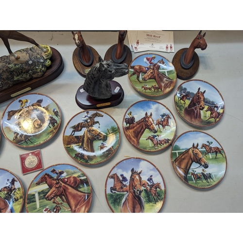 408 - A mixed lot of equestrian related items to include a large Royal Doulton model of a horse entitled T... 